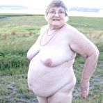 First pic of Fat nan Grandma Libby steps into a puddle before covering herself in mud