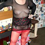 Fourth pic of Old woman models her new red stockings in see thru clothing and heels