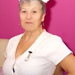 First pic of Mature nurse Savana takes off her uniform and lingerie in white stockings