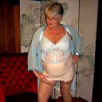 First pic of Obese nan Girdle Goddess uncrosses nylon clad legs to expose her twat