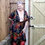 First pic of Old woman Valgasmic Exposed exposes saggy tits and big ass in yard