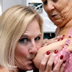Third pic of Granny lesbians lick each others nipples before using bananas as dildos