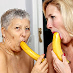 Fourth pic of Granny lesbians lick each others nipples before using bananas as dildos
