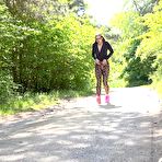 First pic of Pretty girl Barbara Bieber pees on a paved road in pink running shoes