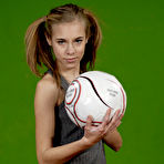 First pic of Petite girl Kelly exposes a breast while holding a soccer ball