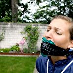 First pic of White girl is left tied up in rainwear with her panties stuffed in her mouth
