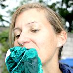 Fourth pic of White girl is left tied up in rainwear with her panties stuffed in her mouth