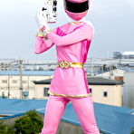 Fourth pic of Solo model Sentai Brave poses in futuristic clothing on a rooftop