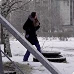 First pic of White girl pulls down her jeans to pee in the snow behind a building