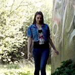 First pic of White girl Viktoria pulls down her jeans to take a pee near a wall of graffiti