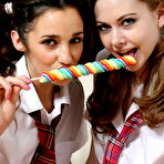 First pic of Lesbian schoolgirls Georgina & Olivia cover their naked tits during a SFW set