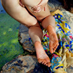 Third pic of Young brunette Keira Blue models completely naked in a brook