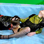 Second pic of Clothed lesbians pleasure each other while getting messy in slime filled pool