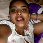 Fourth pic of Indian solo girl pops out her big tits during a set of candid scenes from home - NakedPics