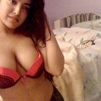 Fourth pic of Busty Indian girl with long hair changes her bras during self shots - NakedPics