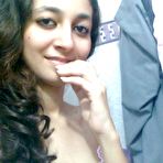 First pic of Indian solo girl holds her face firm while letting nipples free of lingerie - NakedPics