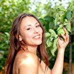 Fourth pic of Sumiko Pulling Down Her Figure-hugging Dress In The Garden - metartdb.com