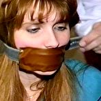 First pic of tied-and-gagged.com | 19 YR OLD NURSE'S AID  GETS BANDANNA GAGGED, HOME MADE LEATHER STRAP GAGGED, BALL-GAGGED AND TIED TO A CHAIR WITH ROPE (d-71-09)