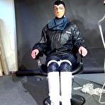 Second pic of Shinynylonartsbound | Lady M bound and gagged in Rainwear, white Rubberboots and Latexhood