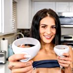 Second pic of VR Latina beauty posing in the kitchen